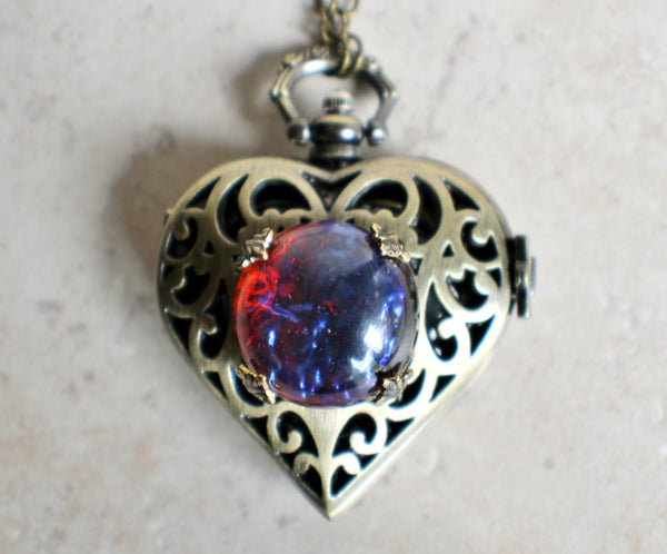 Watch locket with dragons breath glass opal
