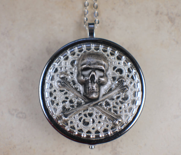 Skull and Crossbones Music Box Locket in Silver