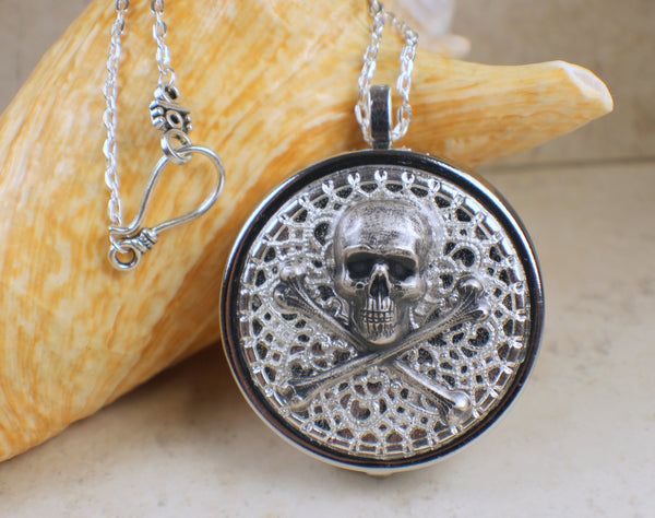 Skull and Crossbones Music Box Locket in Silver