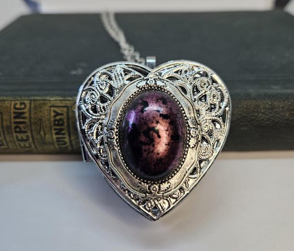 1Music Box Locket with Black and Mauve Setting, Music Box Locket Featuring a Nauve and Bkack Cabochon