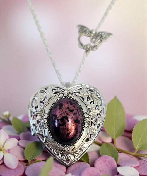 1Music Box Locket with Black and Mauve Setting, Music Box Locket Featuring a Nauve and Bkack Cabochon