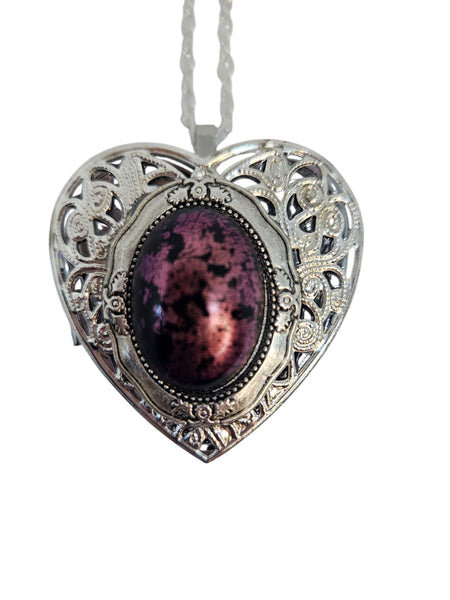 1Music Box Locket with Black and Mauve Setting, Music Box Locket Featuring a Nauve and Bkack Cabochon
