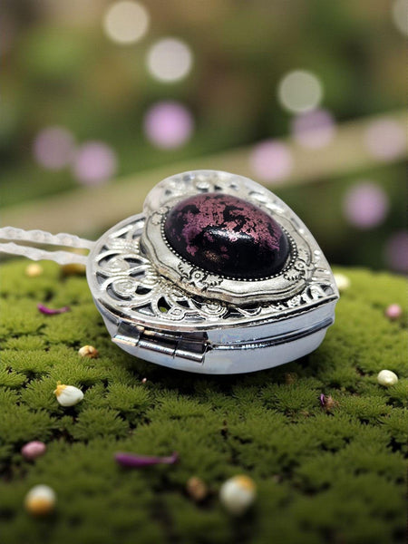 1Music Box Locket with Black and Mauve Setting, Music Box Locket Featuring a Nauve and Bkack Cabochon