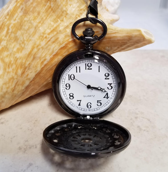 Turtle pocket watch battery operated in black.