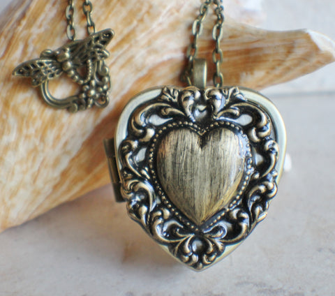 Lacey edge music box locket in bronze tone. - Char's Favorite Things - 1
