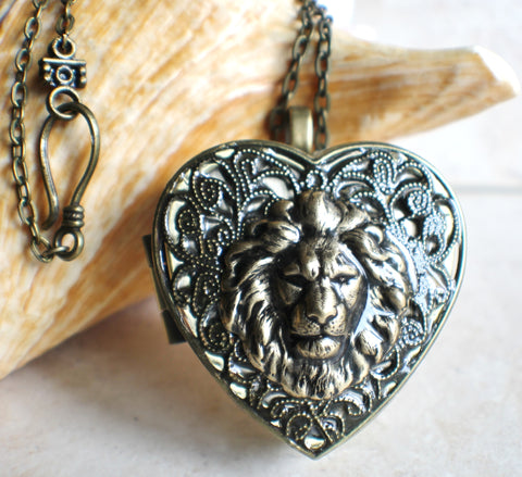 Heart shaped lion music box locket, in bronze. - Char's Favorite Things - 1