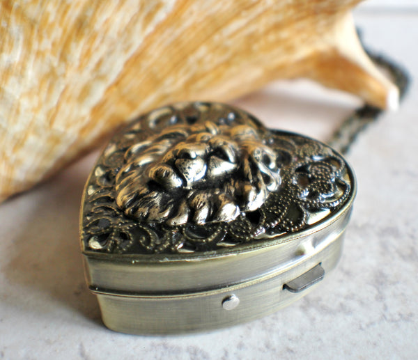 Heart shaped lion music box locket, in bronze. - Char's Favorite Things - 2