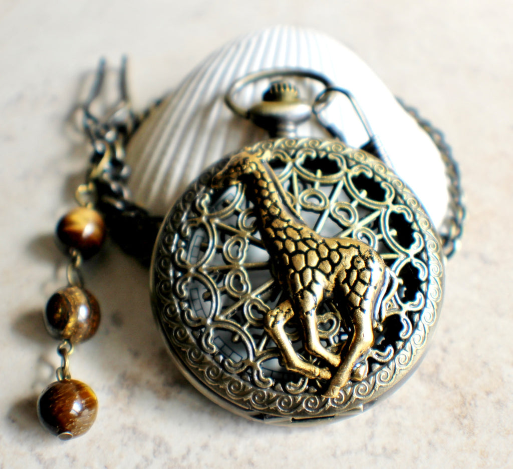 Giraffe battery operated pocket watch in bronze. Char s Favorite