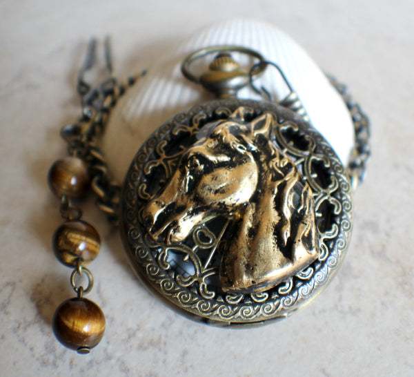 Horse battery operated pocket watch.