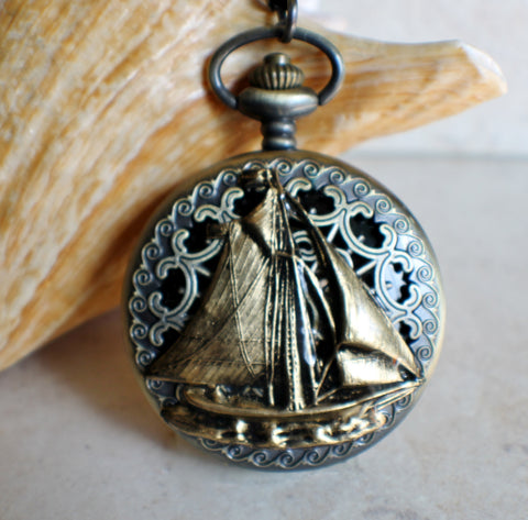 Nautical battery operated pocket watch with sailboat
