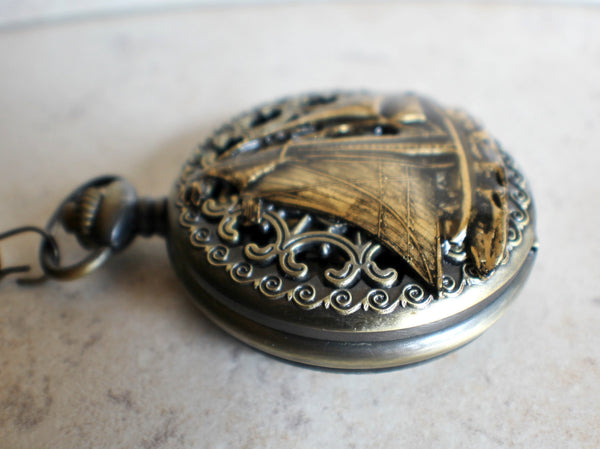 Sailboat mechanical pocket watch with sail boat