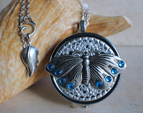 Silver Butterfly music box locket.