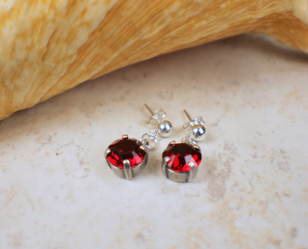 Cz studded ruby red stone drop earrings -