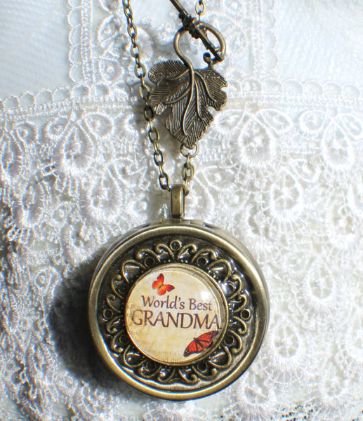 Music box locket,  round locket with music box inside, in silver tone or bronze with "World's Best Grandma" on cover. - Char's Favorite Things - 4
