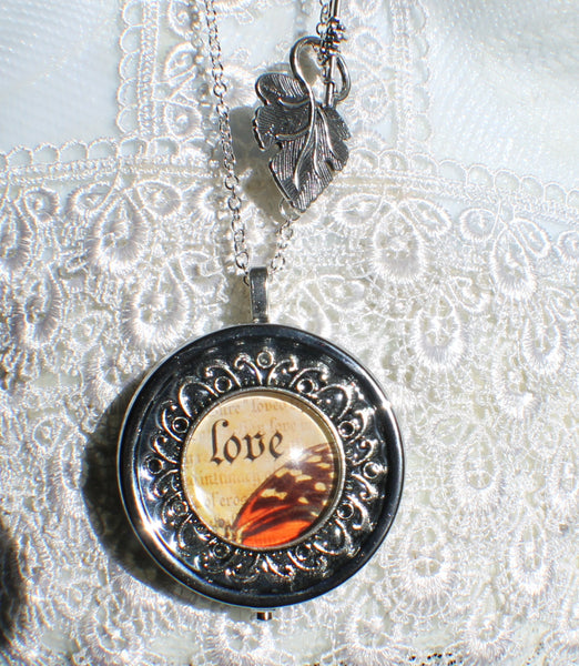 Music box locket, round locket with music box inside, in silver tone with Love and Butterfly Cabochon - Char's Favorite Things - 4