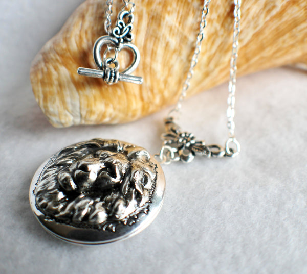 Lion photo locket, round silver tone locket with lion on front cover. - Char's Favorite Things - 2