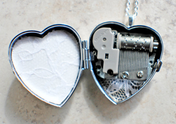 Music box locket, heart locket with music box inside, in silver tone with floral heart, angel wings and dragons breath opal cabochon. - Char's Favorite Things - 5