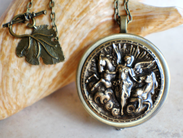 Angel and Horse Medalion Music Box Locket in Bronze. - Char's Favorite Things - 1