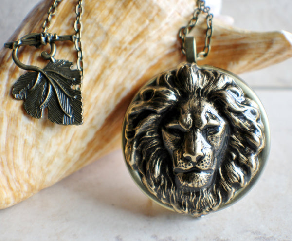 Lion music box locket,  round locket with music box inside, in bronze with lion. - Char's Favorite Things - 1